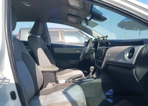 2018 Toyota Corolla Le from USA, damaged, VIN 5YFBURHE1JP759281